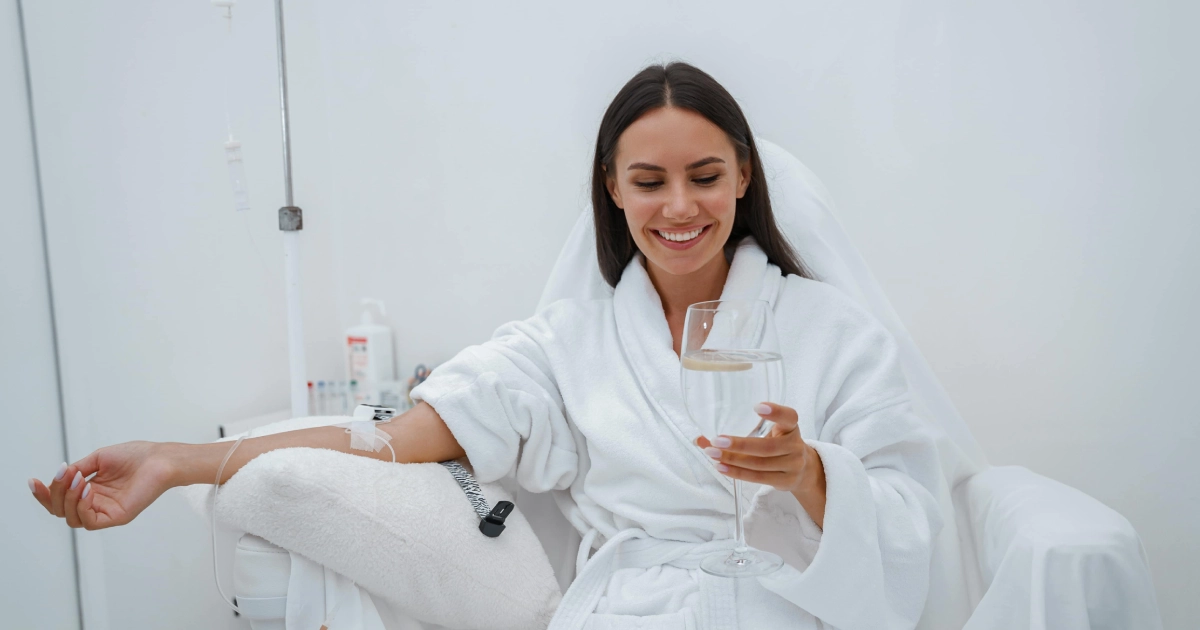Women receiving IV Therapy in Gilroy, CA, relaxing while receiving nutrient infusion treatments.